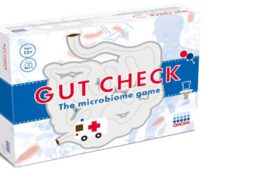 Gut Check board game. Cartoon intestines, bacteria, ambulance on front